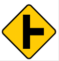 Yellow diamond side on T sign