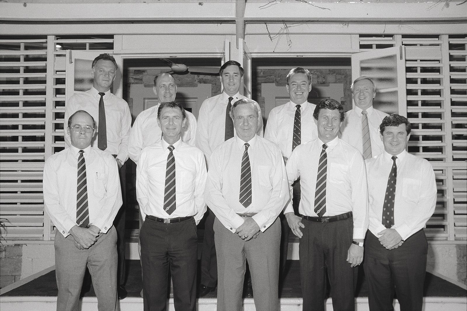 New Ministry, 13 December 1990<br />Back row: Hon. Steve Hatton MLA , Hon Max Ortmann MLA , Hon. Mike Reed MLA, Hon. Daryl Manzie MLA, Hon. Fred Finch MLA <br />Front row: Hon. Roger Vale MLA, Hon. Marshall Perron MLA, Administrator Hon. Justice James Muirhead AC, Hon. Barry Coulter MLA, Hon. Shane Stone, MLA<br />Image courtesy of Library & Archives NT,  Department of the Chief Minister, NTRS 3823 P1, Box 11, BW2950, Image 18