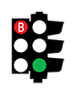 Photo of two traffic lights with one top circle coloured red with a B and the other bottom circle coloured green.