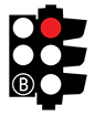 Photo of two traffic lights with one bottom circle coloured white with a B and the other top circle coloured red.